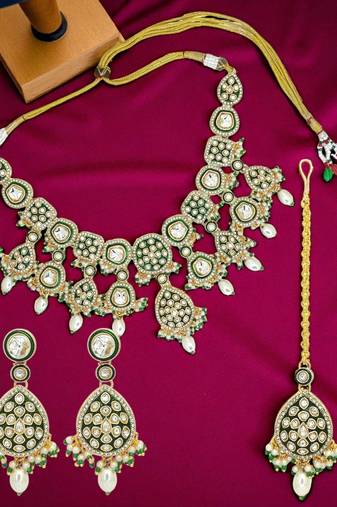 Gold plated green meenakari necklace set with maang tikka