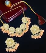 Gold plated peach kundan necklace set
