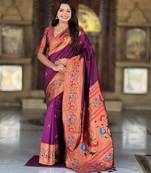 wine faux banarasi silk blend saree with paithani rich weaved pallu and blouse