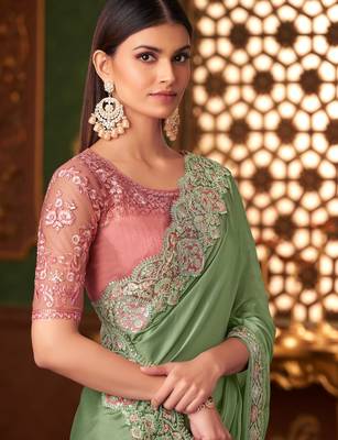 Green satin saree, lace border with heavy embroidered blouse for special occasions 2