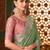 Green satin saree, lace border with heavy embroidered blouse for special occasions