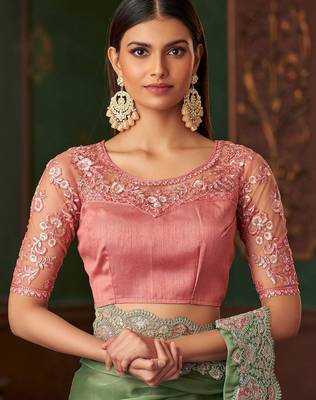 Green satin saree, lace border with heavy embroidered blouse for special occasions 3