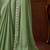 Green satin saree, lace border with heavy embroidered blouse for special occasions