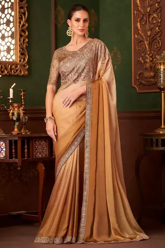 Golden yellow satin saree, lace border with heavy embroidered blouse for special occasions