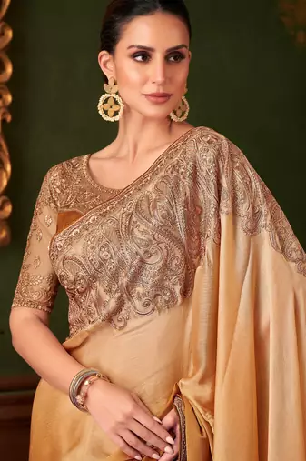 Golden yellow satin saree, lace border with heavy embroidered blouse for special occasions