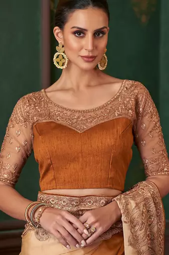Golden yellow satin saree, lace border with heavy embroidered blouse for special occasions