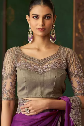 Purple silk chiffon saree, lace border with heavy embroidered blouse for special occasions