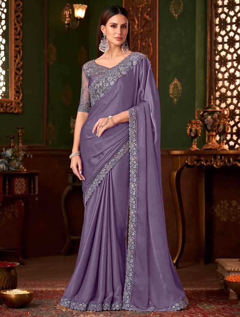 Light purple silk chiffon saree, lace border with heavy embroidered blouse for special occasions