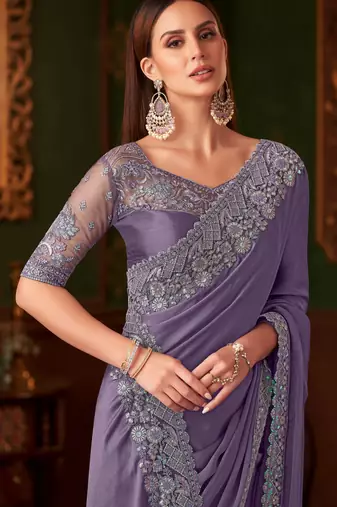Light purple silk chiffon saree, lace border with heavy embroidered blouse for special occasions