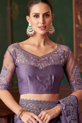 Light purple silk chiffon saree, lace border with heavy embroidered blouse for special occasions