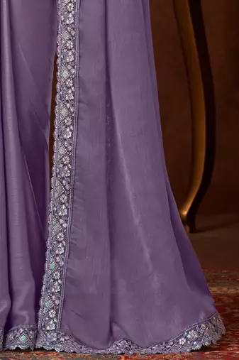 Light purple silk chiffon saree, lace border with heavy embroidered blouse for special occasions
