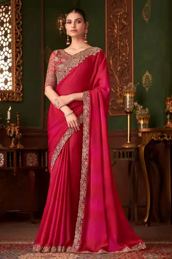 Rani pink satin silk saree, lace border with heavy embroidered blouse for special occasions