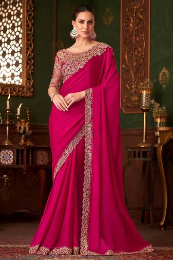 Rani pink satin silk saree, lace border with heavy embroidered blouse for special occasions