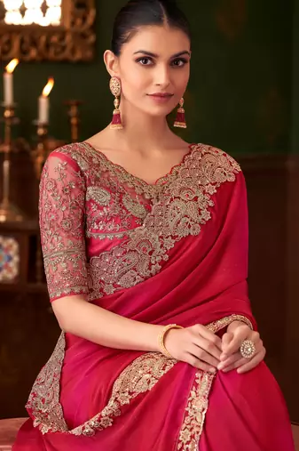 Rani pink satin silk saree, lace border with heavy embroidered blouse for special occasions
