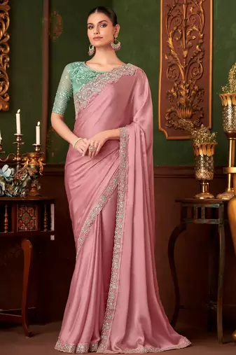 Baby pink silk chiffon saree, lace border with heavy embroidered blouse for special occasions