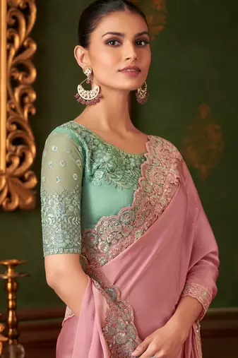 Baby pink silk chiffon saree, lace border with heavy embroidered blouse for special occasions