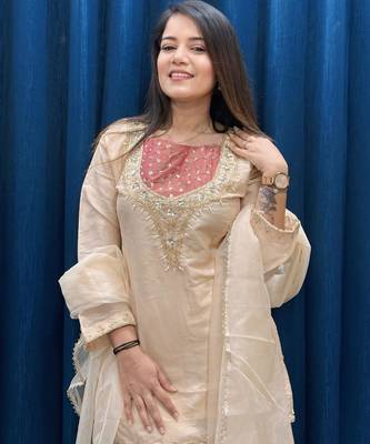 Cream roman shimmer readymade kurti set with hand & moti  2