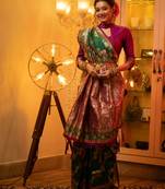 green banarasi silk blend saree with meena weaves, contrast border, grand weaving pallu & tassels with blouse