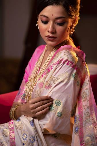 off white banarasi silk blend saree with meena weaves, contrast border, grand weaving pallu & tassels with blouse