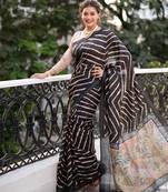 black tussar art silk leriya pattern saree with woven zari border & kalamkari work pallu     comes with blouse