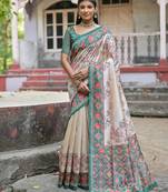 teal tussar art silk patola print saree with floral jal design and contrast blouse piece