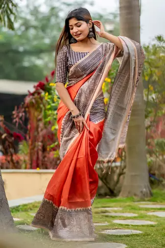 orange tussar art silk madhubani printed saree with traditional pallu & fancy tassels     contrast blouse piece included