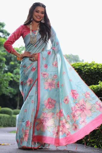 Sky blue tussar silk printed saree with floral pallu, traditional border, fancy tassels & contrast blouse