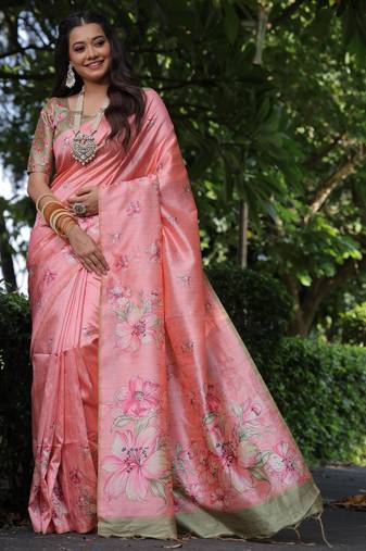 Peach tussar silk printed saree with floral pallu, traditional border, fancy tassels & contrast blouse