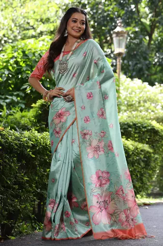 Mint green tussar silk printed saree with floral pallu, traditional border, fancy tassels & contrast blouse