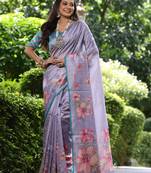 Lavender tussar silk printed saree with floral pallu, traditional border, fancy tassels & contrast blouse
