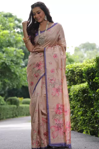 Biege tussar silk printed saree with floral pallu, traditional border, fancy tassels & contrast blouse