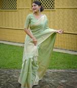 Soft green banarasi raw silk saree with zari lining weaving, premium zari border, designer pallu & running blouse