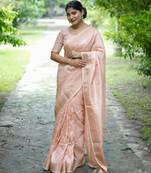 Light pastel banarasi raw silk saree with zari lining weaving, premium zari border, designer pallu & running blouse