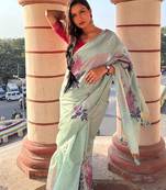 sea green designer muga silk blend saree with all over floral weaving & classic tassels | trendy contrast blouse saree