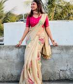 beige designer muga silk blend saree with all over floral weaving & classic tassels | trendy contrast blouse saree
