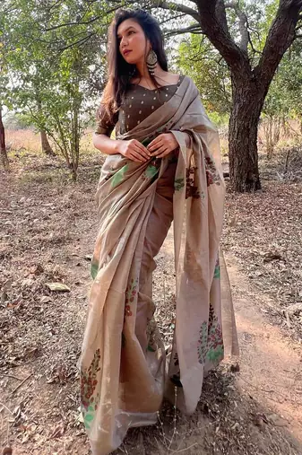 brown designer muga silk blend saree with all over floral weaving & classic tassels | trendy contrast blouse saree