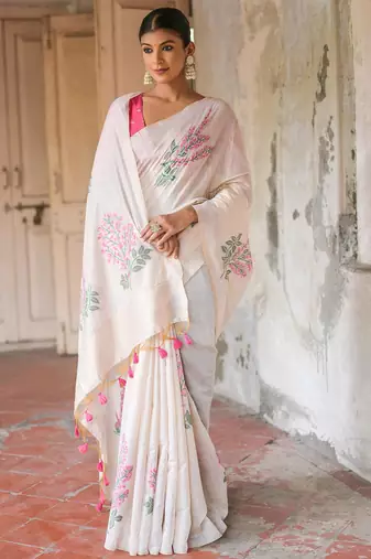 pink soft muga silk blend saree with floral weaving & zari patta pallu with contrast blouse