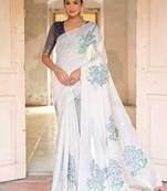 blue soft muga silk blend saree with floral weaving & zari patta pallu with contrast blouse