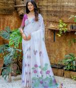 purple soft muga art silk saree with all over floral weaving | pichwai woven pallu | classic tassels | contrast blouse