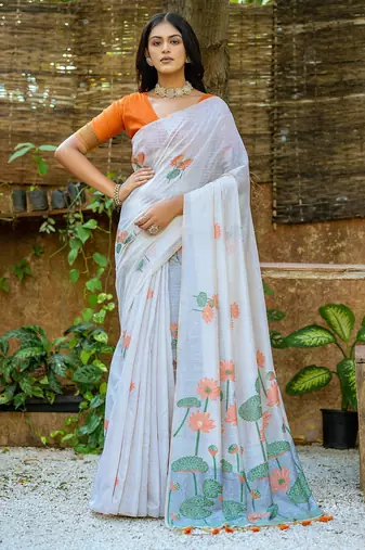 orange soft muga art silk saree with all over floral weaving | pichwai woven pallu | classic tassels | contrast blouse