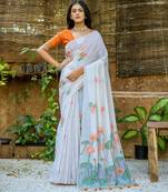 orange soft muga art silk saree with all over floral weaving | pichwai woven pallu | classic tassels | contrast blouse