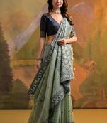 Teal soft muga cotton jamdani saree with all over self weaving & contrast jal pallu with blouse
