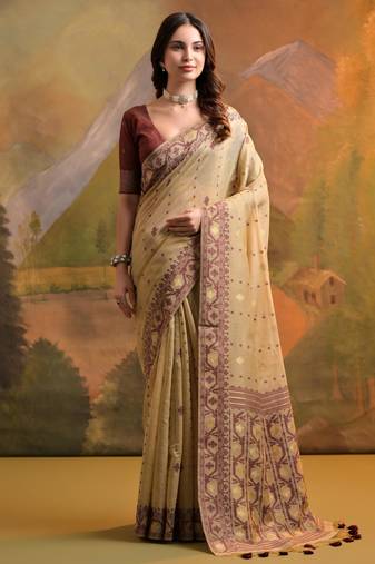 Light beige soft muga cotton jamdani saree with all over self weaving & contrast jal pallu with blouse