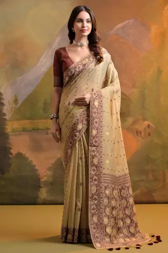 Light beige soft muga cotton jamdani saree with all over self weaving & contrast jal pallu with blouse