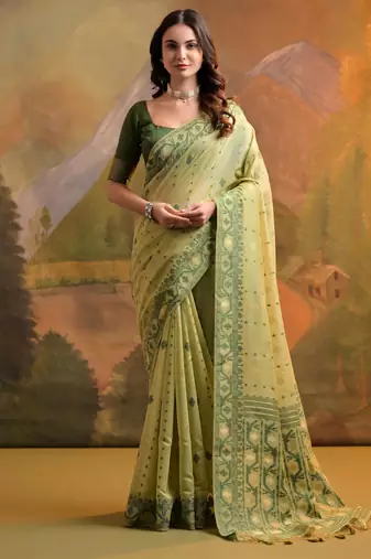 Pista green soft muga cotton jamdani saree with all over self weaving & contrast jal pallu with blouse