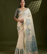 Teal muga cotton saree with kalamkari pallu, figure weaving border & fancy tassels     with blouse piece