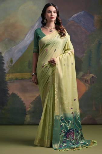 pista green soft muga silk blend saree with peacock resham weaving pallu & traditional zari border with contrast blouse