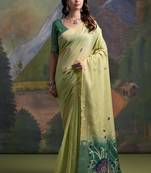 pista green soft muga silk blend saree with peacock resham weaving pallu & traditional zari border with contrast blouse