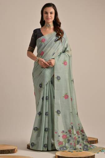 Teal muga cotton saree with motifs weaving pallu & floral buttas | lightweight daily wear saree with tassels & blouse