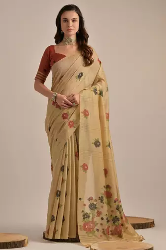 Light beige muga cotton saree with traditional pallu weaving & floral buttas | lightweight daily wear saree with tassels